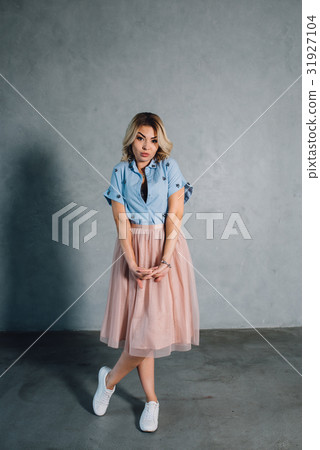 Happy young woman in casual clothes, smiling Happy young woman in casual clothes, smiling 31927104