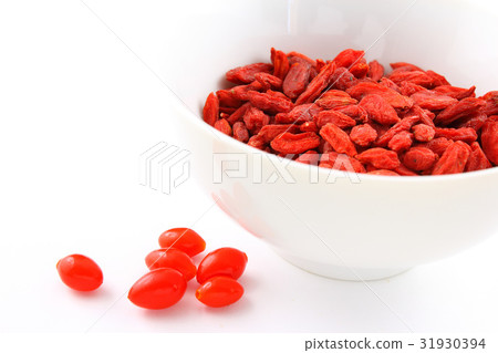 dried goji berries in a small white bowl 31930394