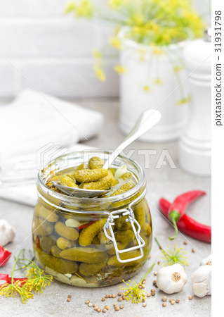 Pickled cucumbers, small marinated pickles Pickled cucumbers, small marinated pickles 31931798