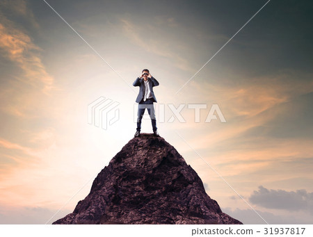business man , binocular lens ontop of mountain business man , binocular lens ontop of mountain 31937817