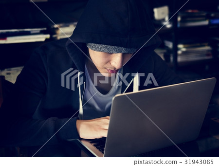 Young asian boy wearing hoodie using digital laptop Young asian boy wearing hoodie using digital laptop 31943085