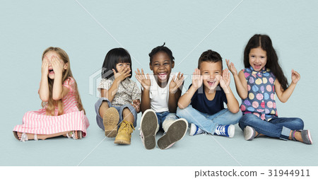 Diverse Group Of Kids Playing Together and Cover Face Diverse Group Of Kids Playing Together and Cover Face 31944911
