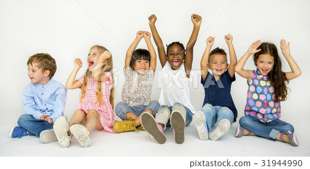 Children sitting and having fun 31944990