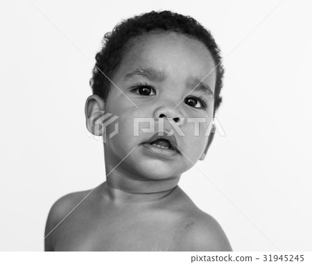 Lonely little boy bare chest studio portrait Lonely little boy bare chest studio portrait 31945245
