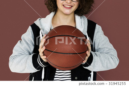 Young Adult Woman with Basketball Studio Portrait Young Adult Woman with Basketball Studio Portrait 31945255