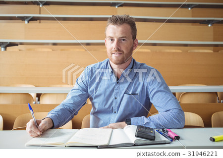 Mature student writing notes Mature student writing notes 31946221