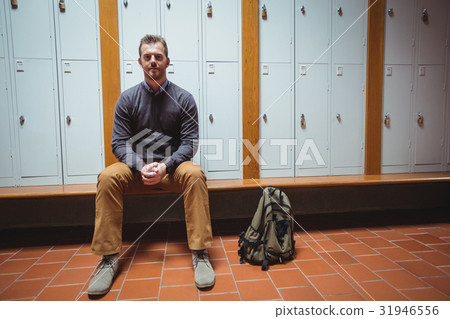 Mature student sitting in the locker room 31946556
