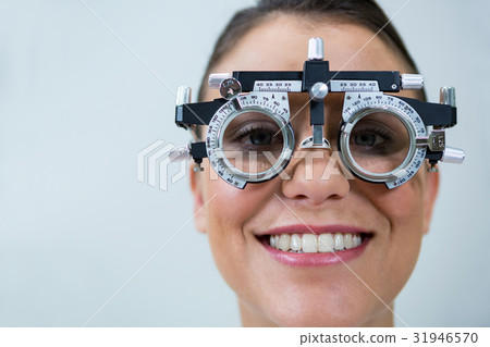 Female patient wearing messbrille during eye examination Female patient wearing messbrille during eye examination 31946570