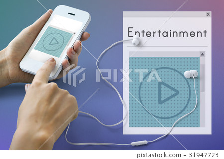 Hands working on digital device network graphic overlay 31947723