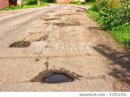 old broken road in the village 31952301