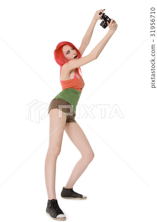 young girl with photocamera isolated on white young girl with photocamera isolated on white 31956710