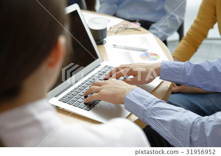 Men using laptops 31956952