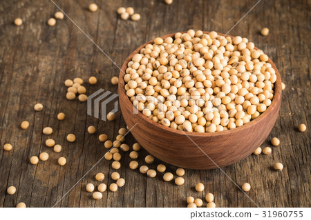 Soybeans in a wooden bowl On the old wood table 31960755