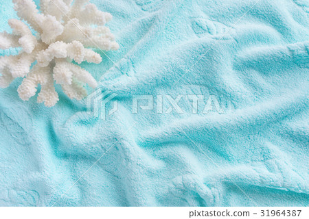 White coral on the terry orange towel White coral on the terry orange towel 31964387