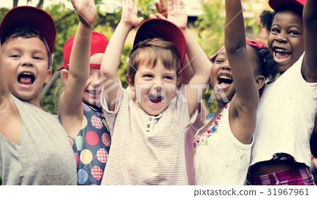 Group of Diverse Kids Hands Raising Up Cheerfully Together 31967961