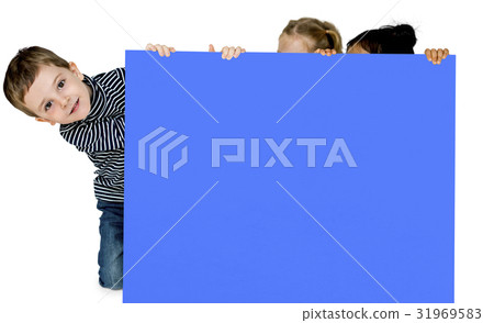 Little Boy Holding Empty Paper Smiling 31969583
