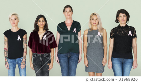 Group of women with pink ribbon for breast cancer awareness campaign Group of women with pink ribbon for breast cancer awareness campaign 31969920