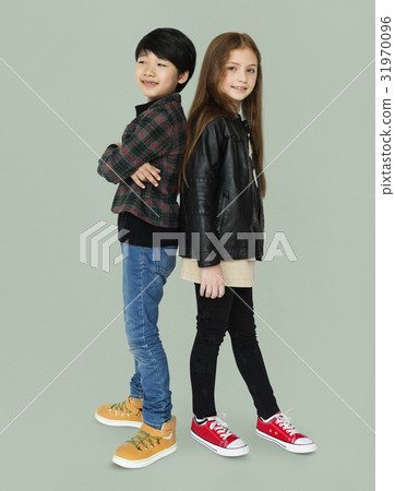 Boy and girl are posing on a shoot Boy and girl are posing on a shoot 31970096