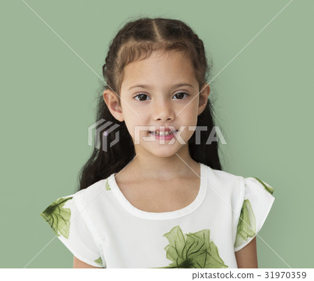 Young little girl with awkward smile expression portrait 31970359