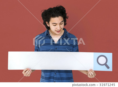 Young adult asian man holding blank searching banner Young adult asian man holding blank searching banner 31971245