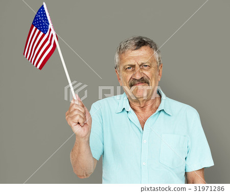 Senior Adult Man Holding American Flag Patriotism Studio Portrait 31971286