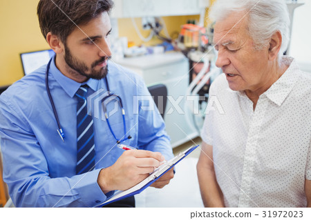 Patient consulting a doctor Patient consulting a doctor 31972023