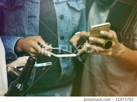 Group of friends share networking with smart phone Group of friends share networking with smart phone 31973787
