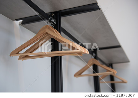 clothes hanger on clothes rail 31975307