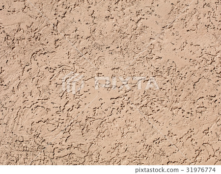 Beige plaster on wall, plasterwork, sand texture Beige plaster on wall, plasterwork, sand texture 31976774