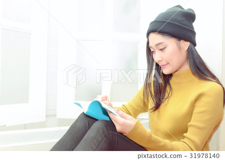 Asain woman write notes, relaxing lifestyle 31978140