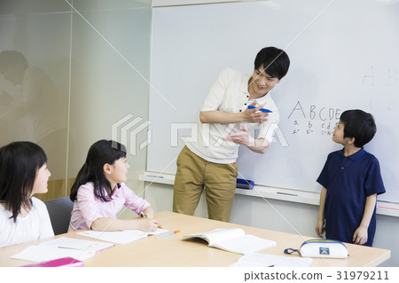 Teacher and elementary school student 31979211