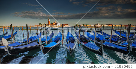 Gondola's against a backdrop of the Chiesa di San Giorgio Maggiore Gondola's against a backdrop of the Chiesa di San Giorgio Maggiore 31980495