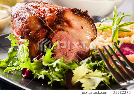 Pork knuckle with fried sauerkraut 31982273