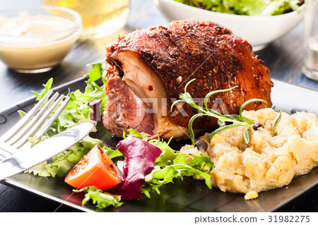 Pork knuckle with fried sauerkraut 31982275