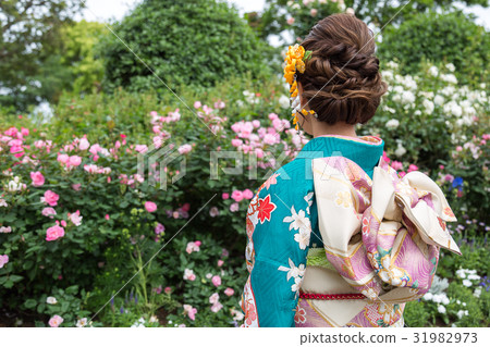 A woman in a kimono A woman in a kimono 31982973