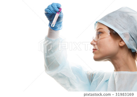 Young doctor in protective glasses Young doctor in protective glasses 31983169