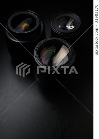 Multiple camera lenses close up Multiple camera lenses close up 31983170