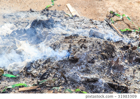 burning garbage with white smoke burning garbage with white smoke 31983309