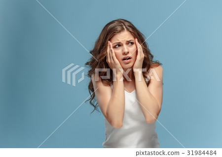 The young woman's portrait with pain emotions The young woman's portrait with pain emotions 31984484