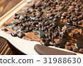 Delicious chocolate cake with sweet drops 31988630