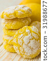 Soft yellow biscuits with citrus juice 31988677