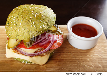 Hamburger with vegetables and cheese Hamburger with vegetables and cheese 31988959