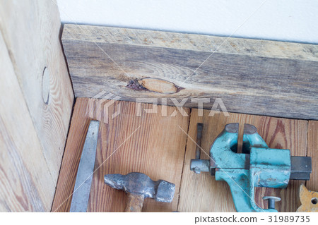 Carpentry tools on a wooden table top Carpentry tools on a wooden table top 31989735