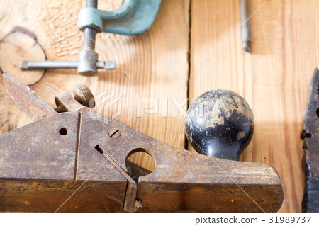 Carpentry tools on a wooden table top 31989737