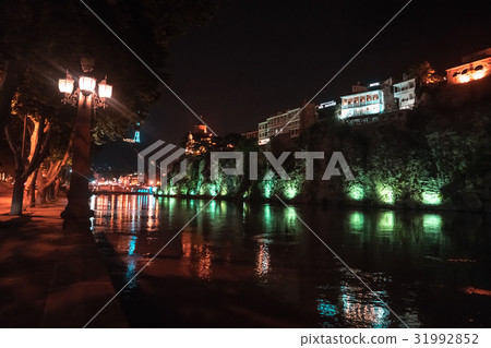 Evening view of Tbilisi and the Kura river at dusk Evening view of Tbilisi and the Kura river at dusk 31992852