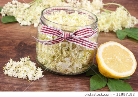 Elderberry flowers and lemon for preparing juice 31997198