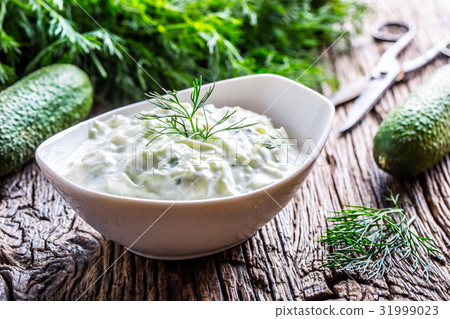 Tzatziki. Traditional greek dip sauce or dressing. 31999023