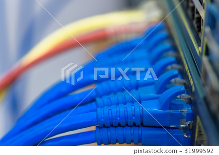 Network switch connected with RJ45 UTP cables 31999592