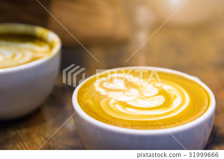 Soft focus on latte coffee cup Soft focus on latte coffee cup 31999666