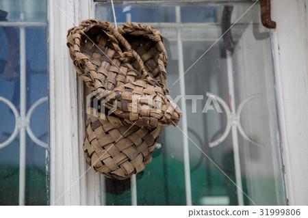 Old traditional Russian bast shoes Old traditional Russian bast shoes 31999806